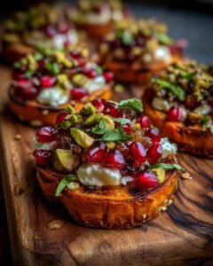Sweet Potato Rounds with Brie, Pomegranate and Pistachios
