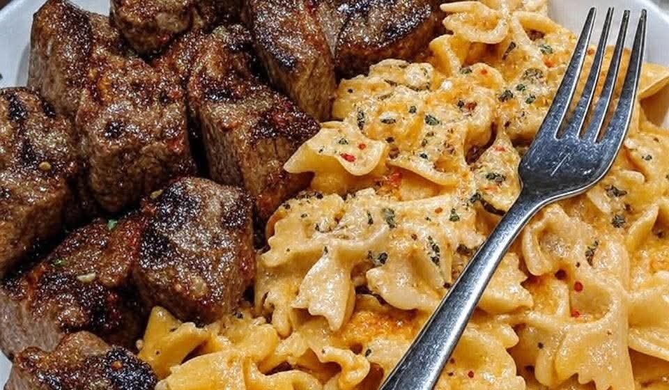 One-Skillet Cajun Steak Tips with Cheesy Bowtie Pasta (Ready in 40 Minutes)